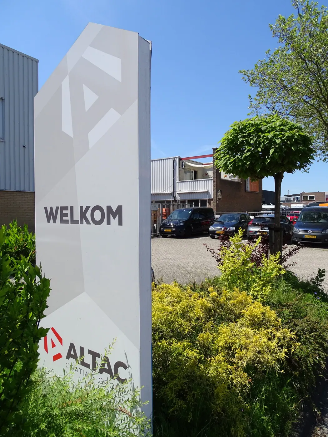 ALTAG Coating Group — Reclamezuil bij entree